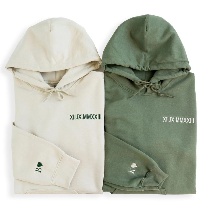 two hoodies are shown side by side, one is green and the other is white