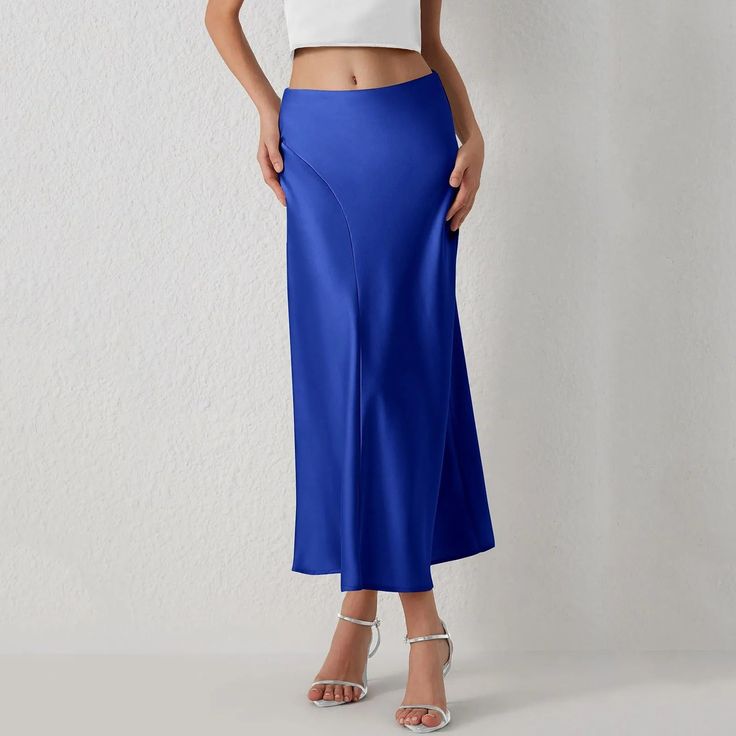 This Seasonal Fave Satin Long Midi Skirt is the new power player in our wardrobe! Features a high waistline, a figure-skimming silhouette with side pleated details for a chic look, and a flowy midi hem Comes in eight colors Made from quality Polyester Available in sizes S-L Model is wearing size S