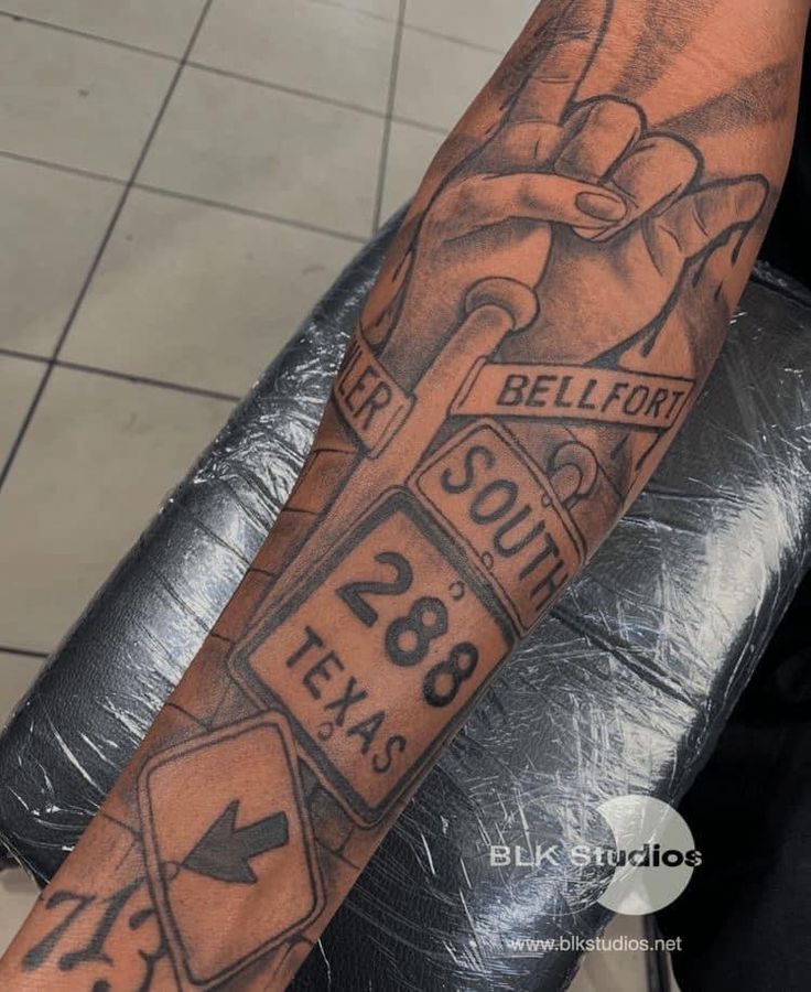 a person with a tattoo on their arm