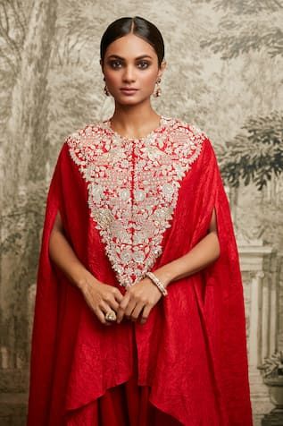 Red silk textured asymmetric kaftan featuring lampi embroidered floral vine motifs, embellished by pearl and sequins. Comes with asymmetric pant. - Aza Fashions Elegant Kurta With Zari Work And Cape Sleeves, Elegant Embroidered Kurta With Cape Sleeves, Festive Embroidered Kaftan With Cape Sleeves, Elegant Red Designer Wear Kaftan, Elegant Red Designer Kaftan, Festive Evening Kaftan With Dupatta, Red Embellished Silk Kurta, Embroidered Evening Kurta With Traditional Drape, Elegant Festive Kurta With Cape Sleeves