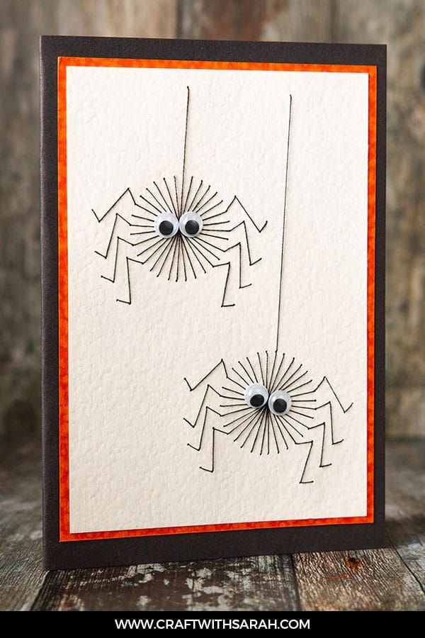 a close up of a greeting card with two bugs on the front and one bug on the back