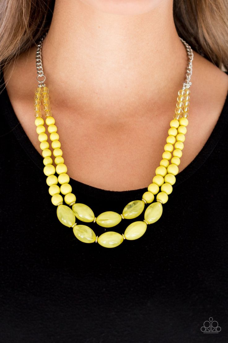 A collection of glassy, polished, and cloudy yellow beads are threaded along two invisible wires below the collar for a beautiful pop of color. Features an adjustable clasp closure. Sold as one individual necklace. Includes one pair of matching earrings. P2ST-YWXX-036XX Tiered Necklace, Yellow Necklace, Nickel Free Jewelry, Cats Eye Stone, Crystal Bead Necklace, Paparazzi Accessories, Paparazzi Jewelry, Necklace Earring Set, Matching Earrings