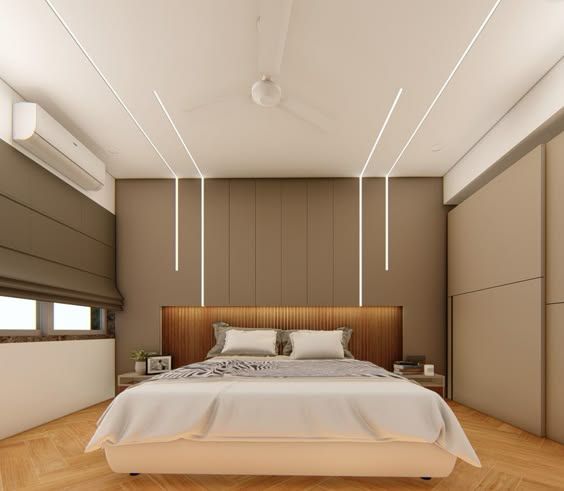 a large bed sitting inside of a bedroom on top of a hard wood floor