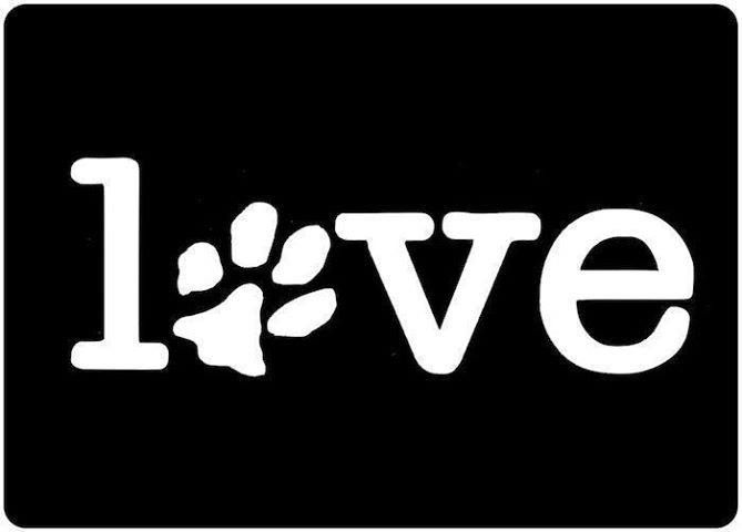 the word love is written in white on a black background, with paw prints that spell out i love