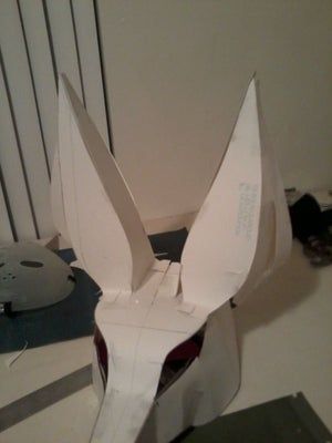 an origami rabbit mask made out of paper