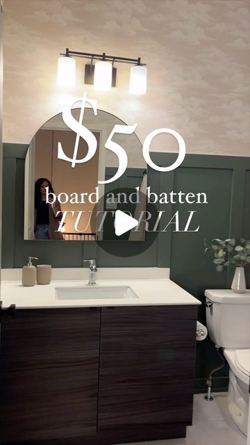 a bathroom with the words $ 350 on it, and a woman in the mirror