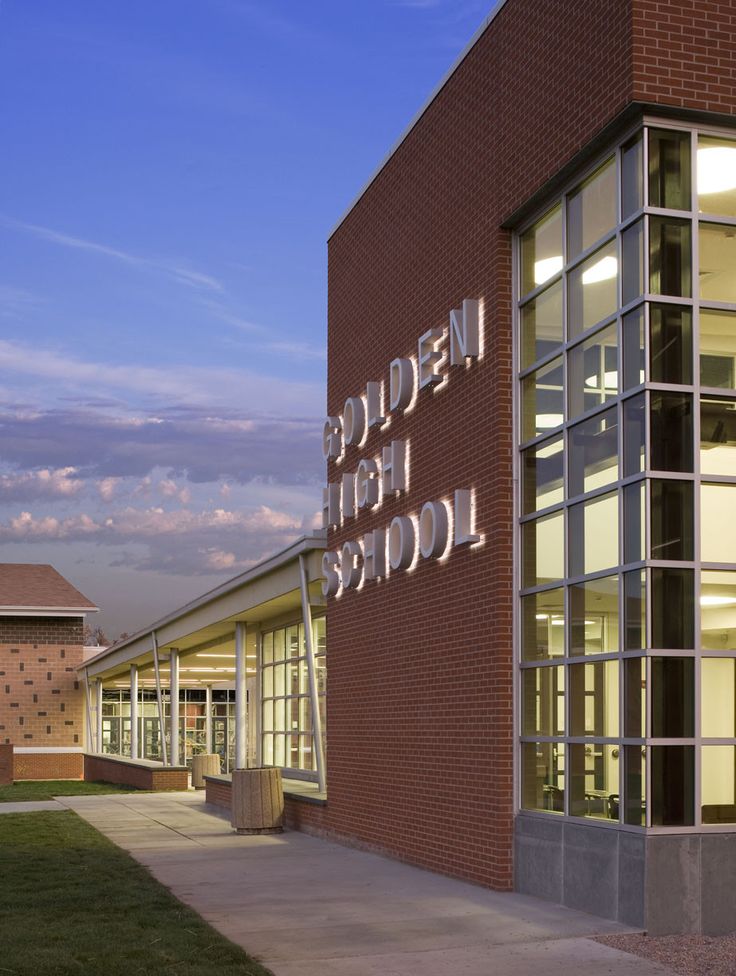 a brick building with the words welcome home to college on it