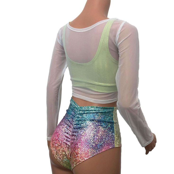 Long sleeve crop top in white stretch mesh. This top is perfect as an overlay to your rave outfit. The mesh is super stretchy and soft. Stretch Mesh Sleeve Crop Top, Summer Crop Top With Mesh Sleeves For Night Out, Stretch Mesh Cropped Top, Y2k White Crop Top For Night Out, Mesh Crop Top With Mesh Sleeves For Night Out, Stretch Mesh Sheer Crop Top, Trendy Fitted Fishnet Crop Top, Trendy Mesh Crop Top For Club, Fishnet Mesh Crop Top For Night Out