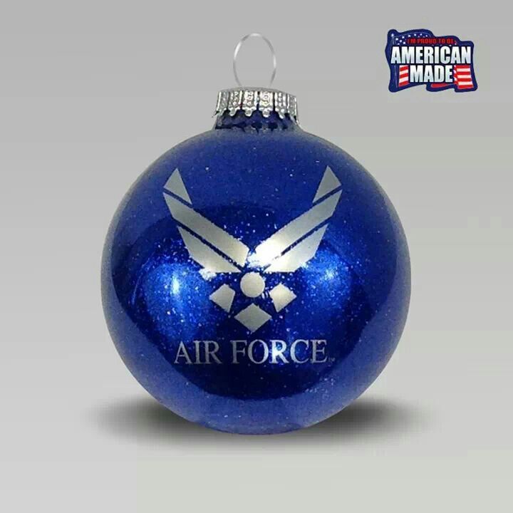 an air force ornament hanging from a christmas tree branch with the american made logo on it