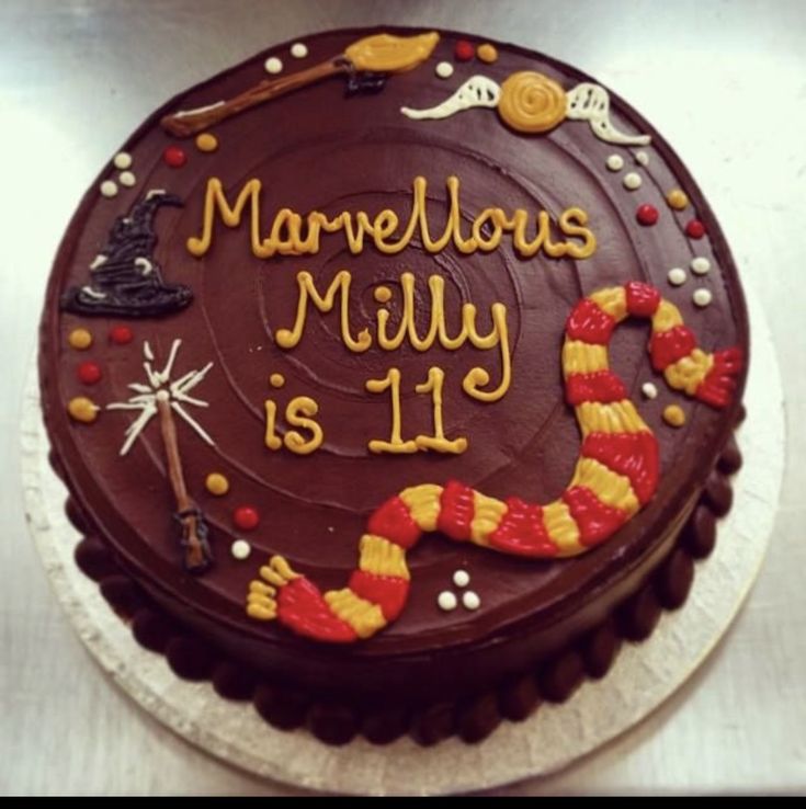 a birthday cake with the words marvelous milly is 11 on it's side