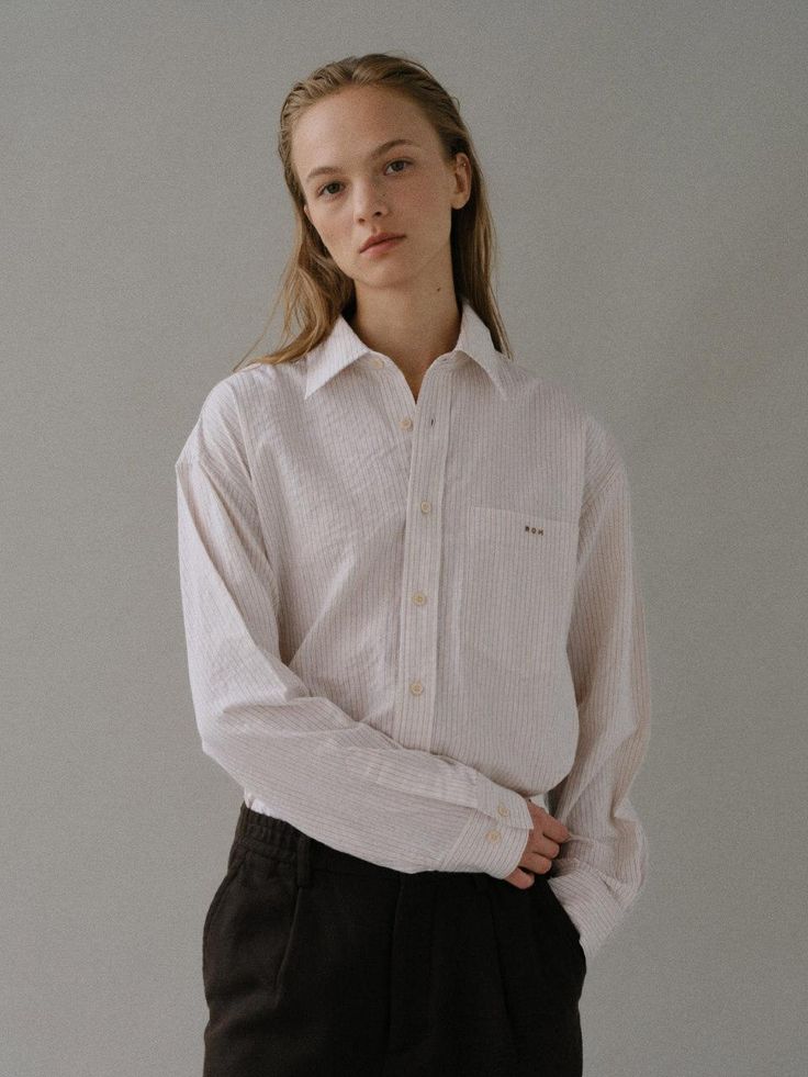 Cut from soft cotton fabric, this oversized fit shirt has classic open collars and button fastenings. It is accentuated with casual striped pattern throughout.  - Intended for a loose fit- Comfortable dropped shoulders- Lightweight cotton blend texture- Mini logo embroidery detail at chest- Rounded hem design Classic Oversized Shirt With Striped Collar, Classic Shirt With Striped Collar For Everyday, Classic Tops With Striped Collar For Everyday, Tomboy Shirts, Mini Logo, Mini Logos, Embroidery Details, Logo Embroidery, Embroidery Logo