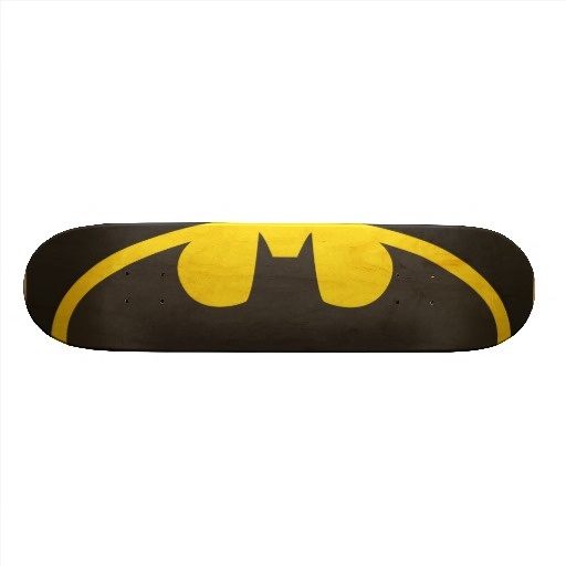 a skateboard with the batman symbol painted on it