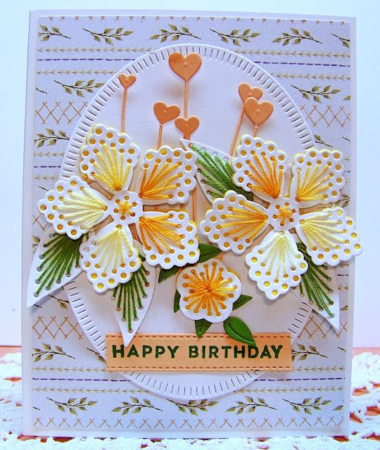 a birthday card with flowers and hearts on it