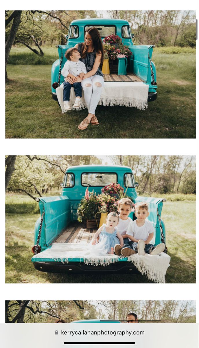 the family is sitting in the back of an old truck with their baby on it