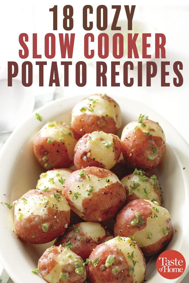 a white bowl filled with potatoes on top of a table