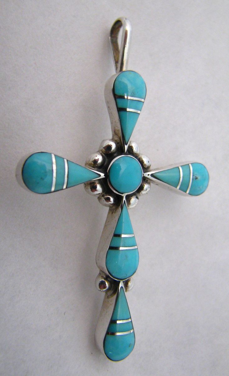 Turquoise Sterling Silver Cross Pendant From New Mexico Stamped "sterling" " B F" Measures 2" L 1 1/8" W Hallmarked Sterling Silver Turquoise Jewelry, Sterling Silver Hallmarked Turquoise Jewelry, Turquoise Inlay Sterling Silver Jewelry, Sterling Silver Turquoise Inlay Jewelry, Spiritual Turquoise Jewelry Stamped 925, Southwestern Blue Cross Jewelry, Southwestern Style Blue Cross Jewelry, Turquoise Spiritual Jewelry With Inlay, Spiritual Turquoise Jewelry With Inlay