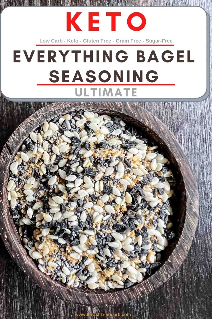 a wooden bowl filled with oatmeal and raisins next to a sign that reads keto everything bagel seasoning ultimate