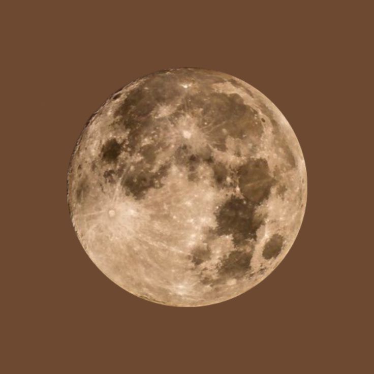 the full moon is shown in brown sky