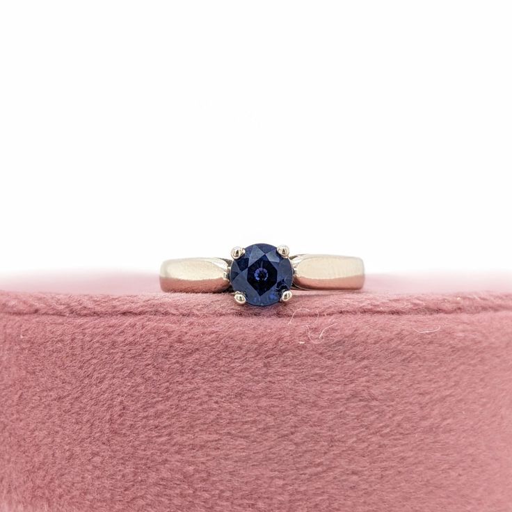 This beautiful ring features a 0.94 carat Blue Sapphire solitaire set in solid 14K gold. This Blue Sapphire ring makes a lovely September birthstone gift for your loved ones! This ring is made with solid 14K Gold. As listed, this ring is ready to ship. If you're interested in purchasing this setting with a different center stone please message us! Blue 14k Gold Birthstone Promise Ring, Blue 14k Gold Birthstone Ring For Promise, Timeless Sapphire Solitaire Promise Ring, Timeless 14k Gold Solitaire Topaz Ring, Blue Solitaire Birthstone Ring With Round Stone, Blue Solitaire Birthstone Ring, Classic Sapphire Solitaire Topaz Ring, Classic Blue Topaz Solitaire Ring, Classic Sapphire Diamond Birthstone Ring