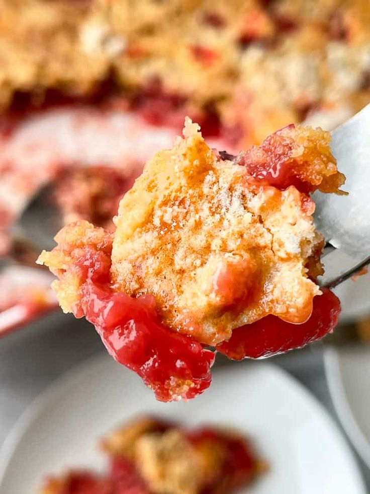 a piece of strawberry cobbler on a fork