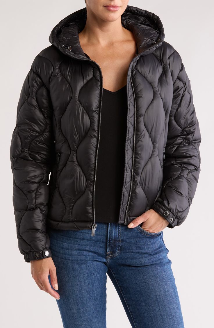 Stay warm in this water-resistant quilted puffer jacket featuring a cozy drawcord hood and secure zip pockets. 23 1/2" length (size Medium) Front zip closure Drawcord-toggle hood Adjustable snap cuffs Front zip pockets Nylon lining, with recycled polyester fill 100% nylon Dry clean or machine wash, tumble dry Imported Black Down Puffer Jacket With Drawstring Hood, Black Quilted Puffer Jacket For Outdoor Activities, Black Quilted Outerwear For Outdoor Activities, Black Quilted Long Sleeve Hooded Jacket, Black Down Puffer Jacket With Zipper, Black Down Puffer Jacket With Zipper Closure, Hooded Quilted Down Puffer Jacket, Functional Hooded Puffer Quilted Jacket, Black Puffer Jacket With Zipper For Outdoor Activities