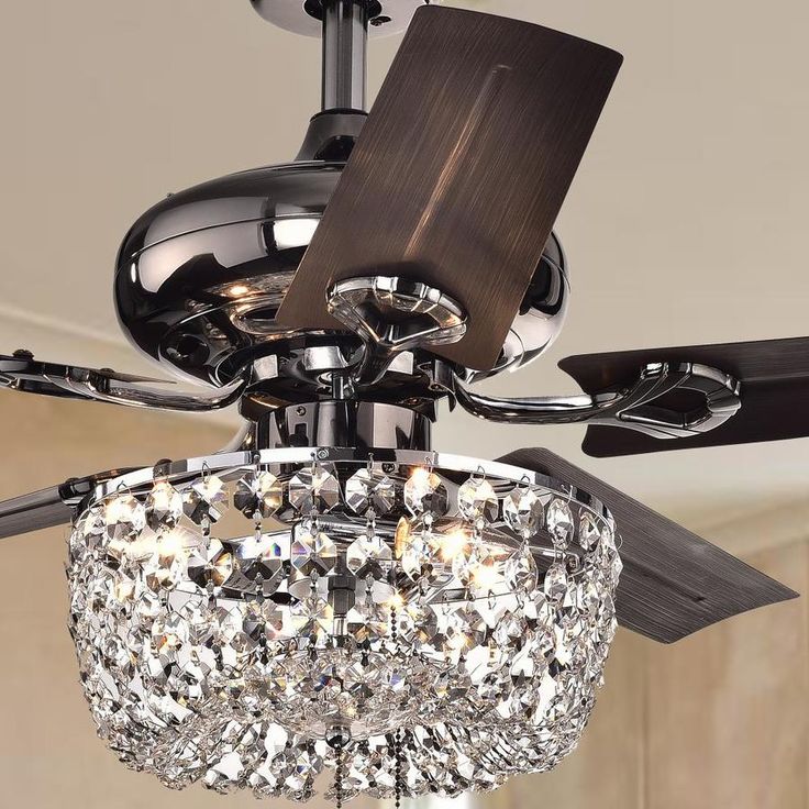 a crystal chandelier hanging from the ceiling