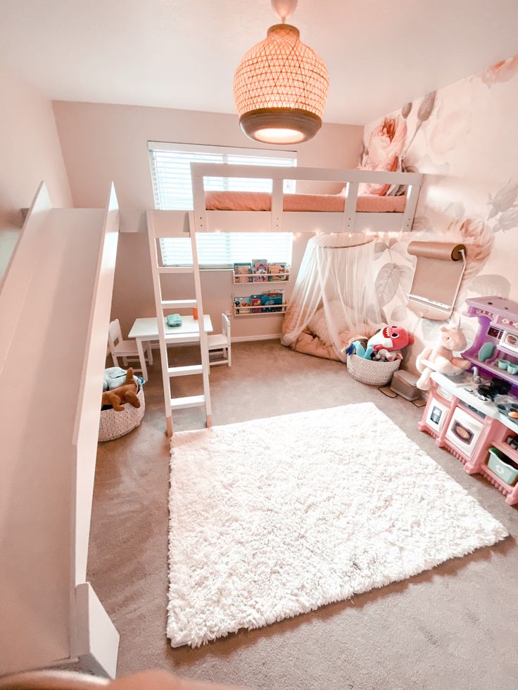 a bedroom with bunk beds and white rugs