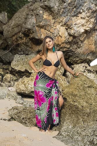 HAWAIIAN PARROT SARONG. Striking parrot sarong wrap with vibrant tropical colors gives you an exotic look and feel. Trimmed with boho fringed edges. Includes a coconut clip for easy tying GENEROUSLY SIZED at 67x 45, this swimsuit cover up fits most sizes. Wear it as a sarong skirt, wrap as a pareo dress, or wear as a shawl. Use for a beach blanket, tablecloth, even a colorful wall hanging 100% RAYON. With a soft, silky feel, rayon is a natural fiber that lets skin breathe. This bathing suit or b Pareo Dress, Tropical Skirt, Colorful Wall Hanging, Wrap Swimsuit, Sarong Wrap, Sarong Skirt, Skirt Wrap, Boho Fringe, Tropical Colors