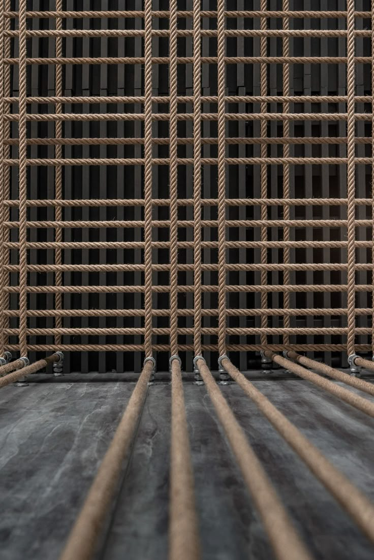 several wooden bars are lined up against a black background