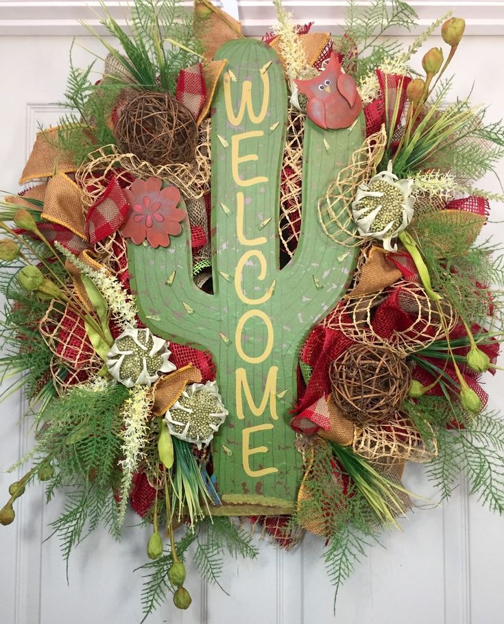 a wreath with the word welcome on it