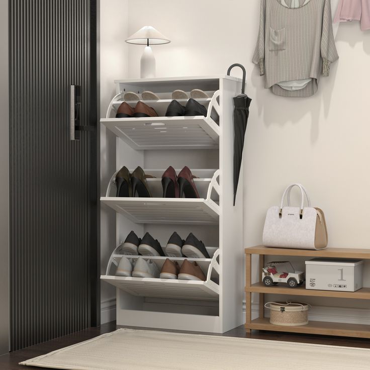 a closet with shoes and purses hanging on the wall next to a coat rack