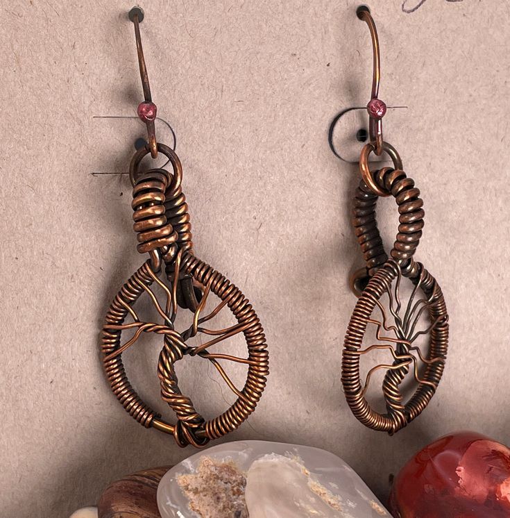 Aged copper tree of life earrings Artisan Copper Wire Drop Earrings, Artisan Wire Wrapped Copper Earrings, Artisan Copper Wire Wrapped Earrings, Nature-inspired Brown Jewelry With Matching Earrings, Handmade Copper Drop Earrings, Copper Wire Dangle Jewelry Gift, Bronze Wire Wrapped Drop Earrings, Copper Wire Drop Earrings With Matching Set, Nickel Free Copper Wire Earrings As A Gift