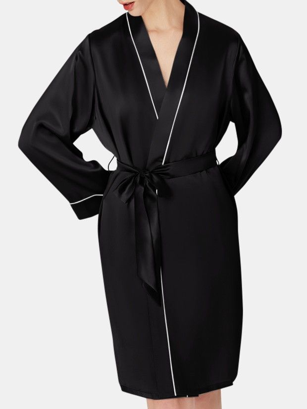 Crafted from pure silk, this two piece luxury silk robe and slip set is endlessly appealing. This supremely soft robe is cut with a relaxed fit and a classic crossover silhouette, secured with a sash belt at the waist. A simple silk slip skims the hips, and features adjustable shoulder straps. Understated and elegant, this slip dress and matching silk robe is cut from silk for an irresistibly soft feel against the skin. Elegant Satin Kimono With Satin Finish, Elegant Spring Sleepwear For Night, Elegant Spring Sleepwear, Elegant Satin Wrap Kimono, Elegant Spring Kimono For Sleep, Silk Fitted Robe For Loungewear, Fitted Silk Robe For Loungewear, Chic Silk Kimono For Lounging, Chic Silk Kimono For Loungewear