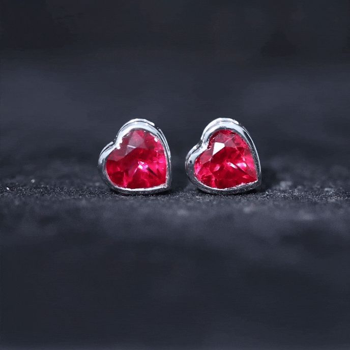 Product Details Beautiful and Alluring Lab Created Ruby Stud earrings are adorned with a stunning Solitaire Heart Shape Lab Created Ruby is set in a bezel setting. Add some color to your jewelry collection with this gemstone earring. An ideal accessory for any occasion. Product Information SKU SHP-EARRINGS042014565 Length 7.6 mm Width 7.6 mm Height 4.2 mm Weight 1.52 gm (Approximate) LAB CREATED RUBY INFORMATION No.of Stones 2 Pieces Total Weight 4.00 Carat (Approximate) Dimension(approx) Heart-8X8 mm-2 Pcs Color Red Cut Brilliant Shape Heart Setting Type Bezel-Setting Quality Grade AAAA View More Product Parent Collection Handle lab-created-ruby-earrings Heart-shaped Gemstone Earrings For Anniversary, Heart Shaped Gemstone Earrings For Anniversary, Anniversary Heart-shaped Gemstone Earrings, Heart-shaped White Gold Gemstone Earrings, White Gold Heart Gemstone Earrings, White Gold Heart Shaped Gemstone Earrings, Heart-shaped Birthstone Earrings For Wedding, White Gold Heart Earrings With Gemstones, Heart Shaped Birthstone Earrings For Wedding