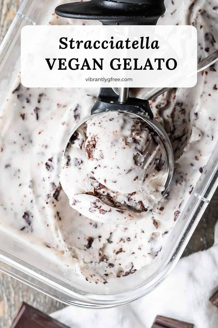 a scoop of ice cream with chocolate chunks in it and the text overlay reads, stracciatella vegan gelato