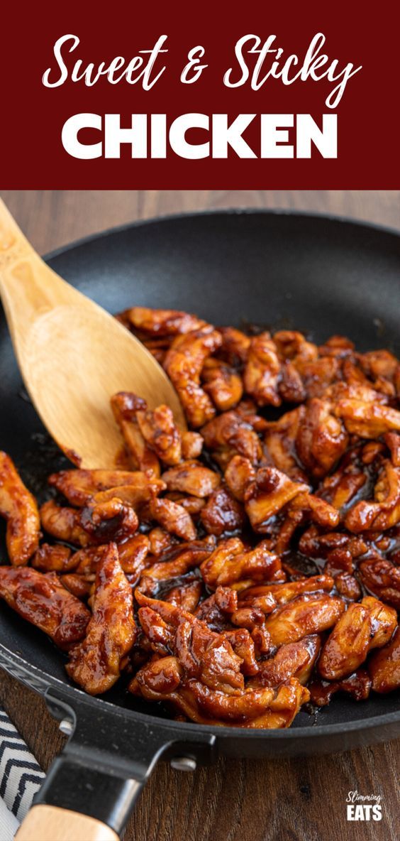 sweet and sticky chicken in a skillet with a wooden spoon on the side that says, sweet and sticky chicken