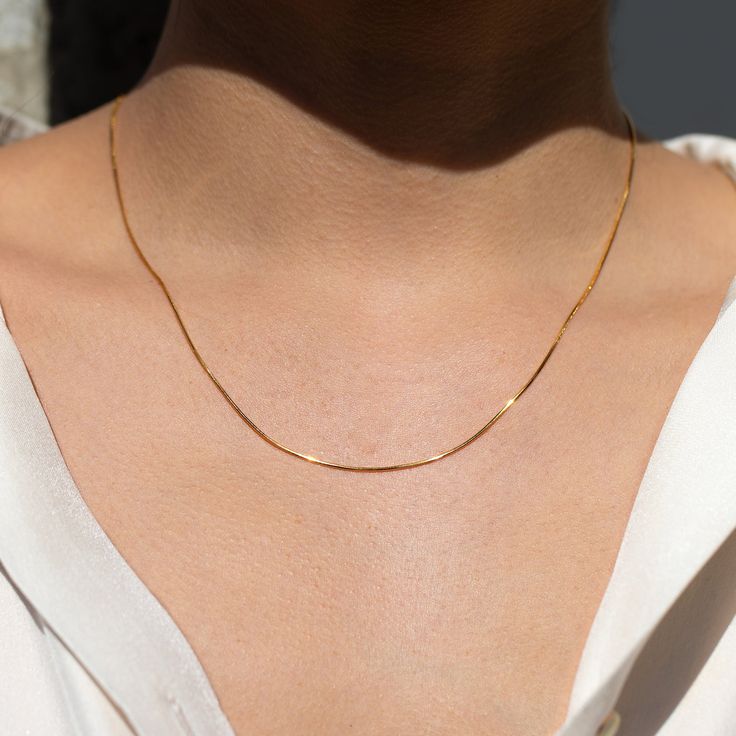 Escape to a place where the sun shines as bright as gold. Our Monaco Snake Chain Necklace will mentally take you there everywhere you go! It is perfect for creating your unique necklace stack. Minimalist Snake Chain Charm Necklace For Everyday, Delicate Yellow Gold Snake Chain Necklace For Everyday, Everyday Yellow Gold Delicate Snake Chain Necklace, Yellow Gold Delicate Snake Chain Necklace For Everyday, Everyday Yellow Gold Adjustable Snake Chain Necklace, Everyday Delicate Snake Chain Charm Necklace, Trendy Everyday Delicate Snake Chain Necklace, Everyday Trendy Delicate Snake Chain Necklace, Everyday Gold Delicate Snake Chain Necklace