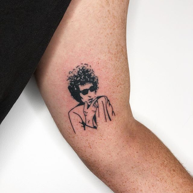 The Kooks Tattoo, Glam Rock Tattoo, Bob Dylan Tattoo Ideas, Big Lebowski Tattoo, Talking Heads Tattoo, The Clash Tattoo, Rock Band Tattoos, Bob Dylan Tattoo, Elton John Tattoo