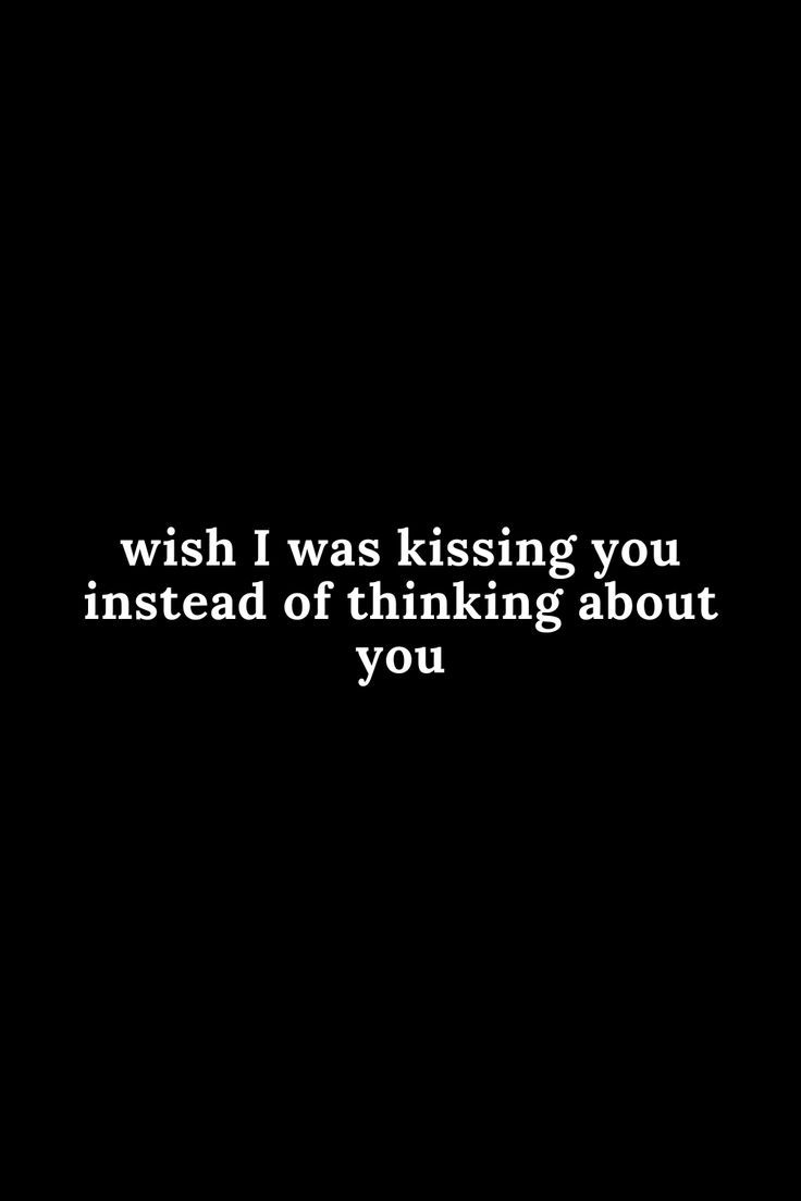 a black and white photo with the words wish i was kissing you instead of thinking about you