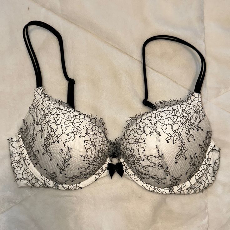 White With Black Lace Very Sexy Push Up Bra. Never Worn. Bought New. Size 34c. Party Bra With Removable Pads In White, White Party Bra With Removable Pads, White Underwire Bra For Night Out, White Padded Bra For Party, Victoria's Secret White Bra With Removable Pads, White Victoria's Secret Bra For Party, Victoria's Secret White Party Bra, White Push-up Bra For Party, White Victoria's Secret Party Bra