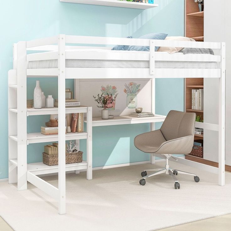 a white loft bed with desk underneath it