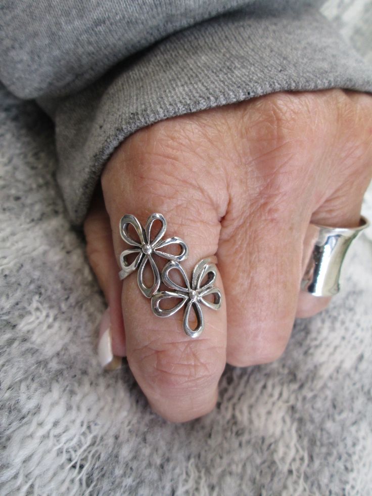 "Beautiful 925 sterling silver heavy double flower ring. Nice detailing, open design, well made. It measures 1 1/8\" long, slightly wraps your finger for a great fit. Various sizes in dropdown. Stamped 925. KEEP*IN*TOUCH FOLLOW and LIKE us on www.facebook.com/jkcorpjewelrycollection www.instagram@jkcorpjewelrycollection Thank you for visiting our shop!" Flower Silver Ring, Sterling Silver Ring For Spring, Rings Women Silver, Spring Sterling Silver Ring, Silver Promise Rings For Spring, Bohemian Flower Ring As A Gift, Silver Sterling Silver Flower Ring For Spring, Silver Open Flower Ring For Spring, Silver Flower Shaped Rings For Spring