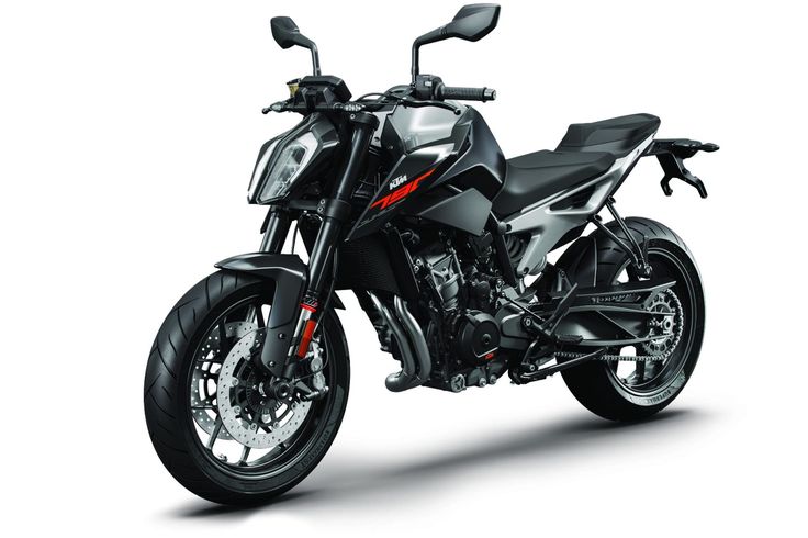 a black and silver motorcycle is shown on a white background with red trimmings