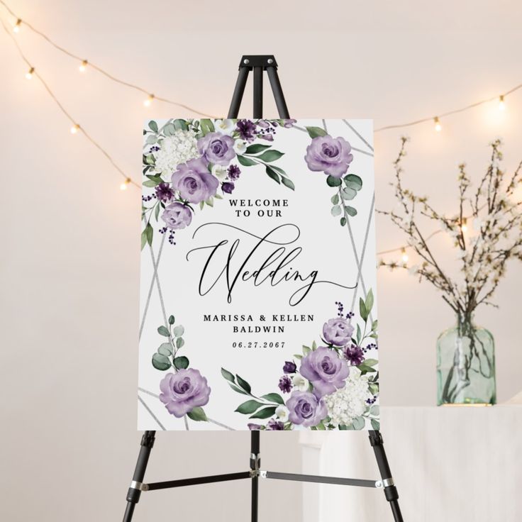 an easel with a wedding sign on it