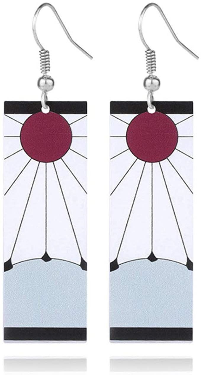 two pairs of earrings with an abstract design on the front and back of each pair