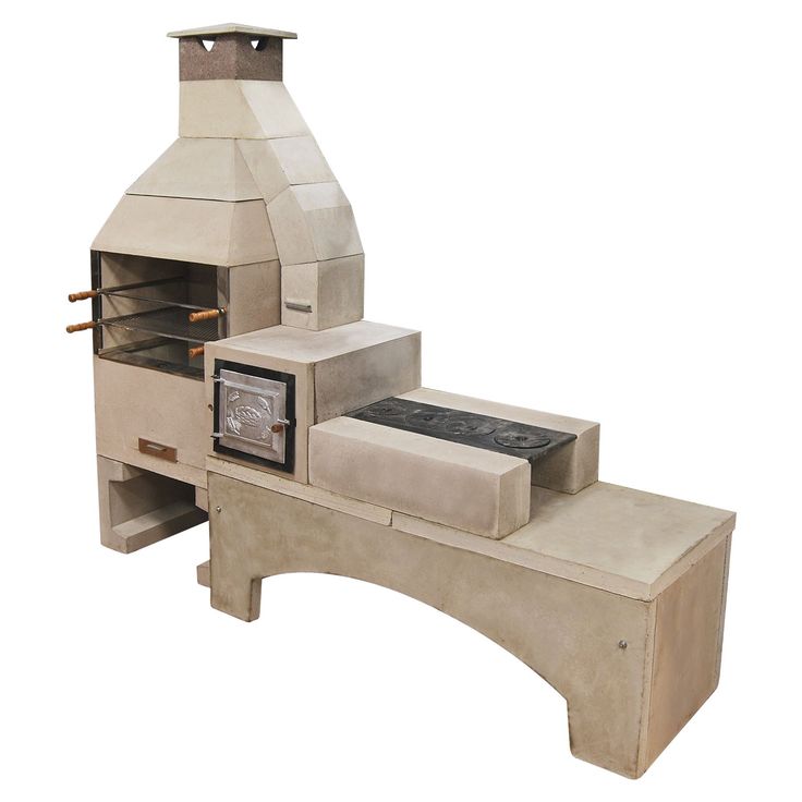 an outdoor oven made out of concrete with steps leading up to it and a stove on top