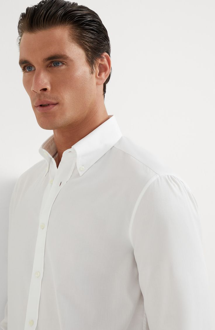 Pure cotton twill is a lightweight, comfortable fabric, suitable for year-round wear. Placket closure with mother of pearl buttons Button-down collar Cuffs have two mother of pearl buttons Basic-fit Timeless Collared Shirt With Placket, Spring Timeless Collared Dress Shirt, White Shirt With Concealed Placket For Summer, Timeless White Shirt With Placket, Classic White Shirt With Covered Buttons, White Slim Fit Dress Shirt For Daywear, Timeless White Shirt With Fold Down Collar, White Shirt With Hidden Button Closure For Spring, Classic White Tops With Covered Buttons