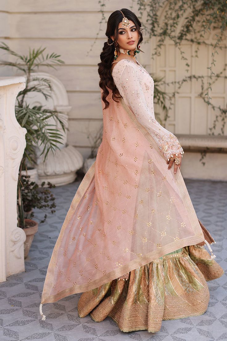 Soft pink kaamdani shirt with heavy handworked daman sleeves and neckline. Chattapati sharara and kaamdani dupatta.You can order it with a single dupatta and straight pants. Golden Sharara, Pakistani Wedding Dresses, Straight Trousers, Pakistani Wedding, Long Shirt, Straight Pants, Kids And Parenting, Dress Making, Soft Pink