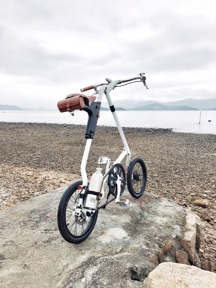 an electric scooter parked on top of a rock