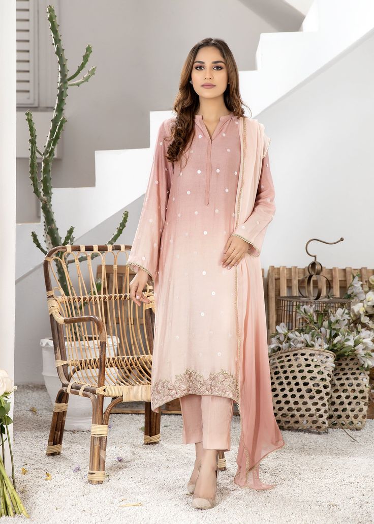 Tea pink pure cotton net shaded shirt handworked with sequins and beads all over. Comes with matching pure viscose silk pants. Spring Cotton Silk Sets With Mirror Work, Pink Silk Palazzo Set With Mirror Work, Designer Pink Sequined Salwar Kameez, Pink Sequined Kurta For Eid, Pink Chikankari Embroidery Cotton Silk Sets, Pink Pant Set With Dabka Work, Pink Silk Set With Sequins, Pink Silk Sequined Set, Pink Sequined Silk Set